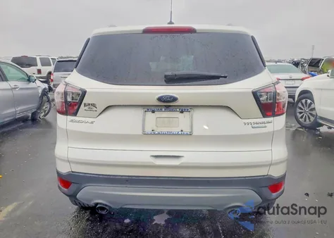 2017 Ford Escape Titanium z USA, uszkodzony, nr VIN 1FMCU0JD7HUB56443